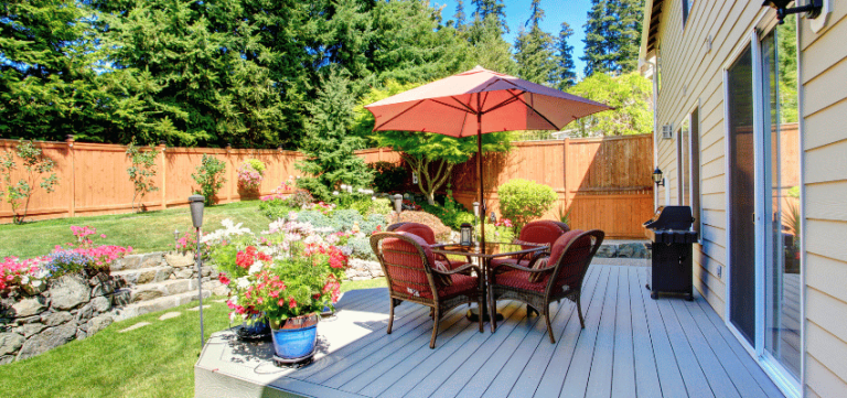 Backyard patio area with landscape