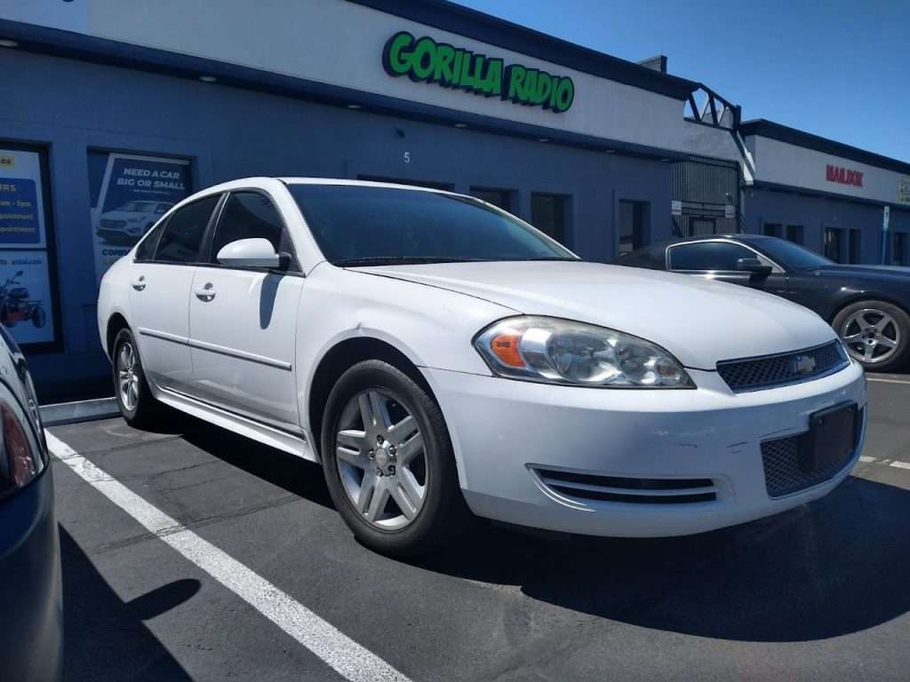White car on parking lot